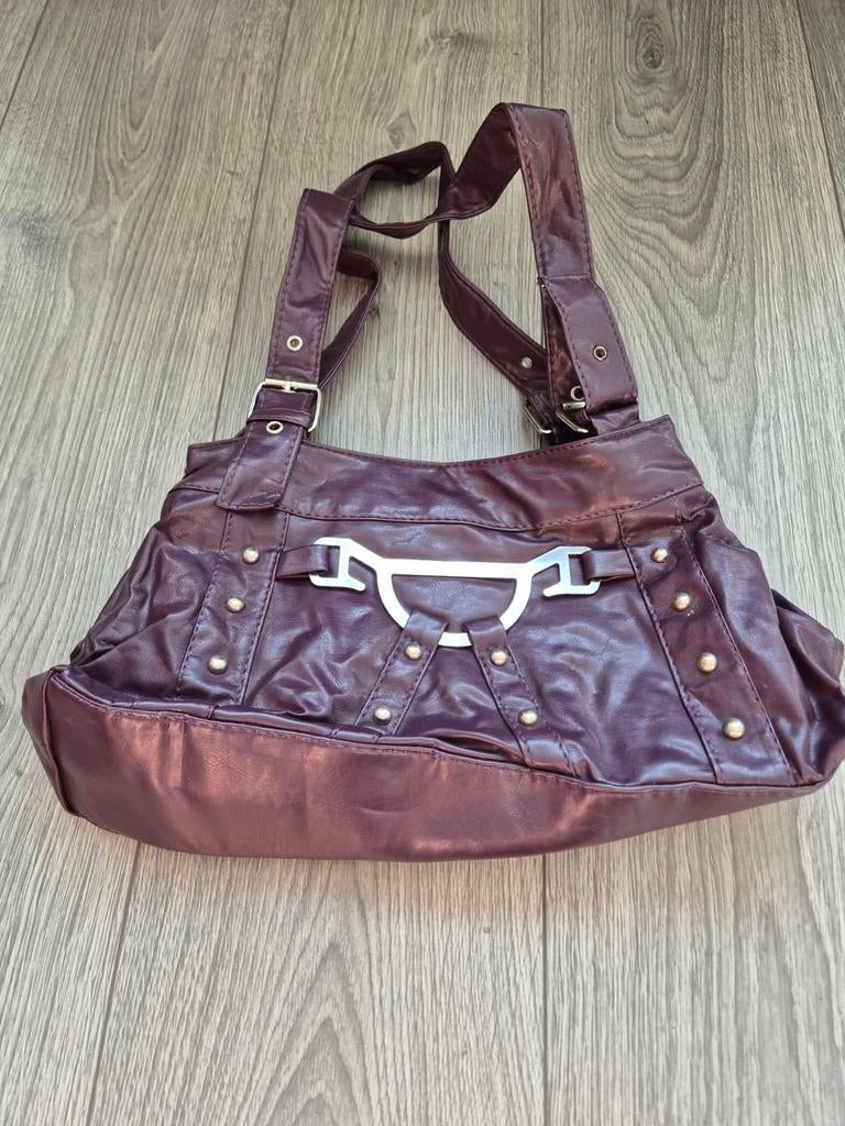 Paarse tas, Ophalen