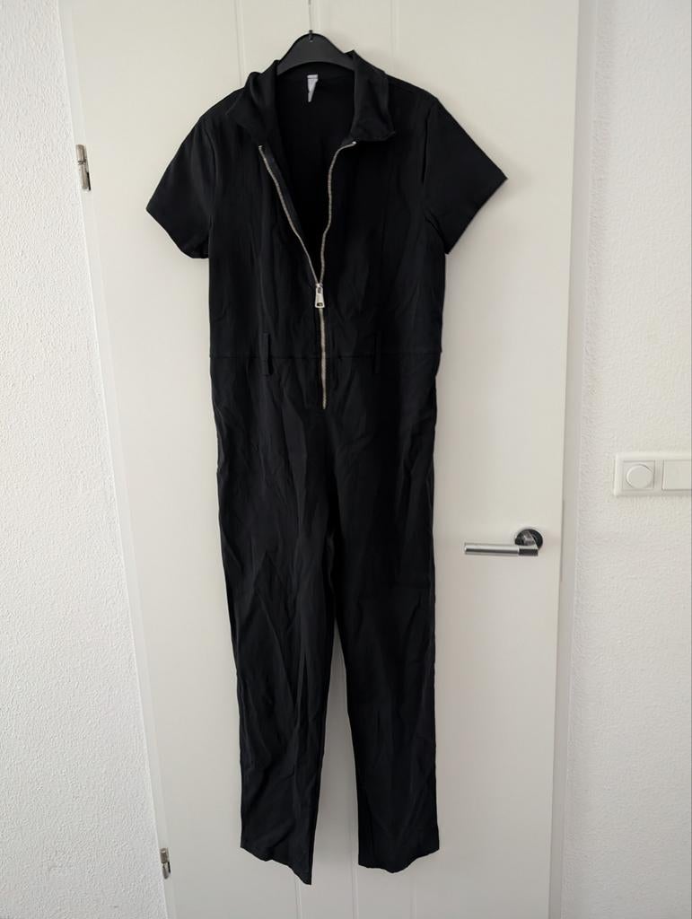 Zwarte jumpsuit met rits - Maat 40/42, Kleding | Dames, Jumpsuits, Ophalen of Verzenden