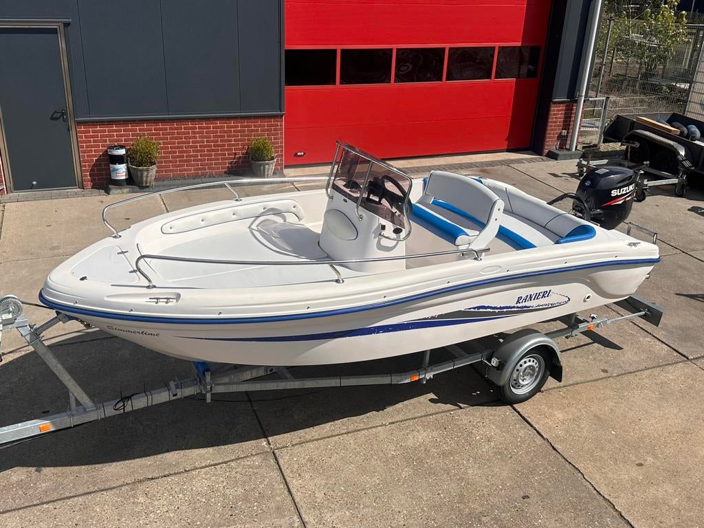 Zeer nette consoleboot(ranieri)compleet met motor en trailer, 70 pk of meer, Ophalen of Verzenden, 3 tot 6 meter, Buitenboordmotor