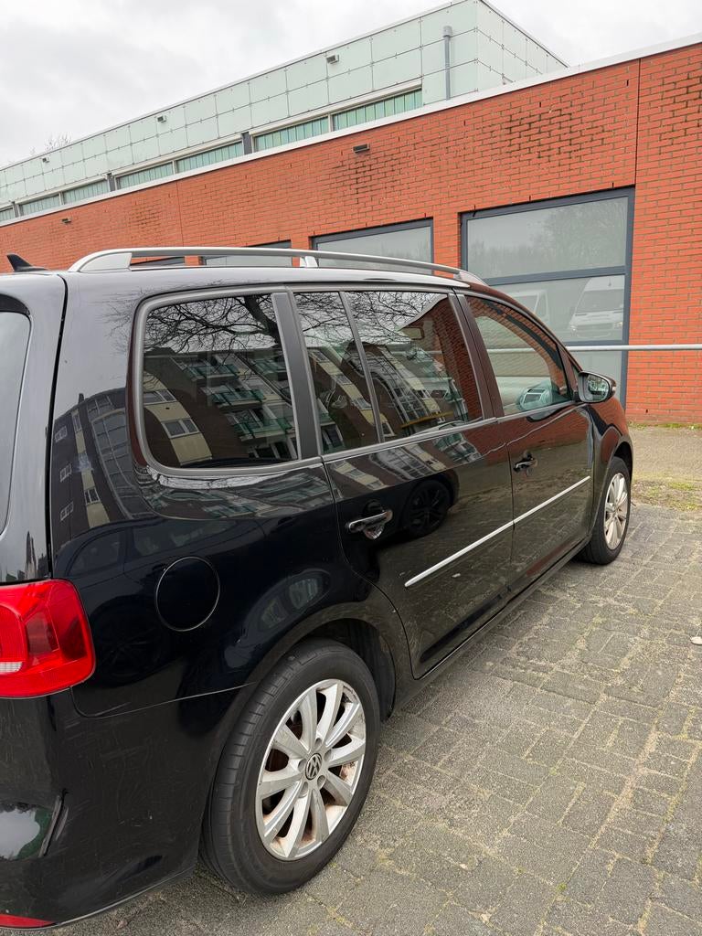 Volkswagen Touran 1.2 TSI 77KW BMT 2011 Zwart, Auto's, 730 kg, 4 cilinders, Zwart, Origineel Nederlands