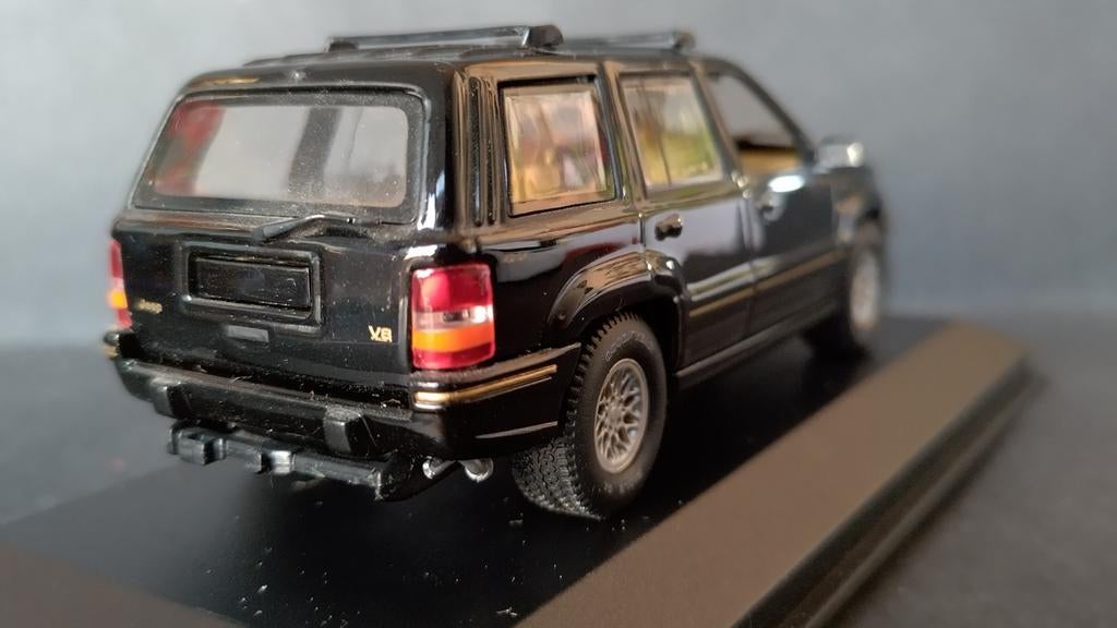 Jeep Grand Cherokee 1:43 Minichamps Pol, Hobby en Vrije tijd, Auto, Verzenden, Zo goed als nieuw, MiniChamps