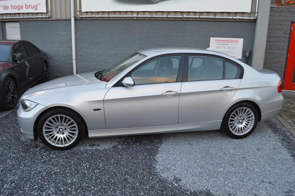 BMW 3-serie 318i Business Line Airco Leer Navi Stuurbekracht, Auto's, BMW, Achterwielaandrijving, 4 cilinders, 129 pk, Handgeschakeld