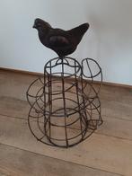 aparte metalen eieren mand, Ophalen