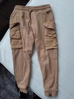 Te koop: jogging cargo beige maat 110, Z8, Gebruikt, Ophalen