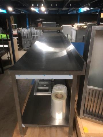 rvs werktafel 200x70x85 h bodemschap en opstaande rand .  beschikbaar voor biedingen