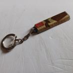 Leuke oude Sleutelhanger.  Venz cocolade.   Naturel., Ophalen of Verzenden, Zo goed als nieuw