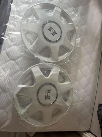 Te koop set wieldoppen 15 inch hobby caravan origineel beschikbaar voor biedingen