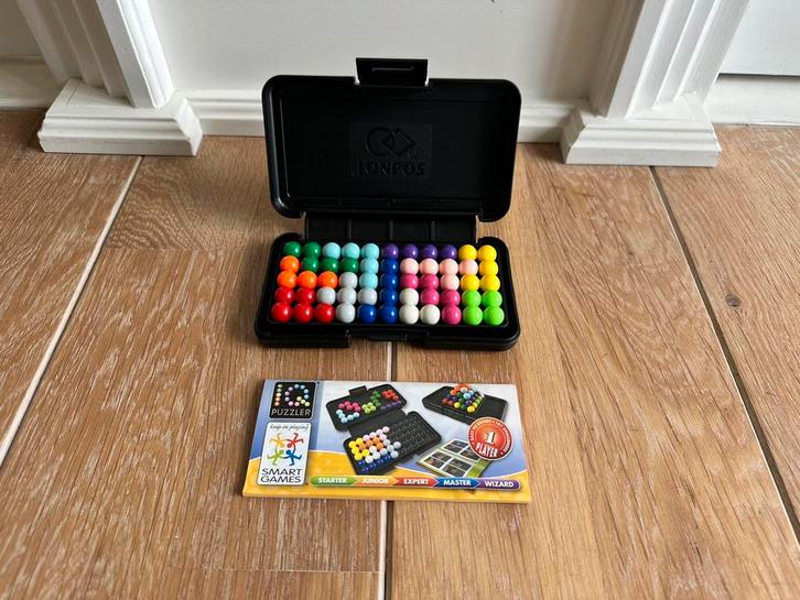 IQ Puzzle van Smart Games in zwarte kunststof Box., Hobby en Vrije tijd, Denksport en Puzzels, Zo goed als nieuw, Ophalen