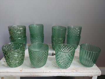 12 waxinelichthouders  beschikbaar voor biedingen