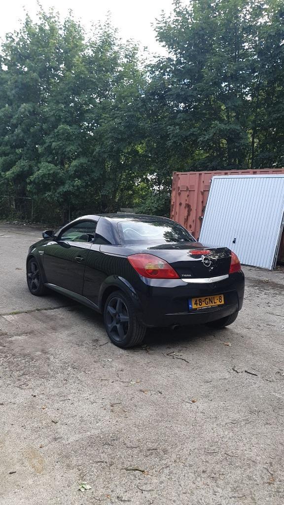 GDKP Opel Tigra cabrio 1.4 Twintop BJ2008 Zwart NWE APK08/26, Auto's, Opel, Particulier, Tigra, ABS, Airbags, Centrale vergrendeling
