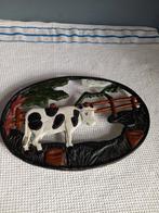 Gietijzeren onderzetter, Ophalen