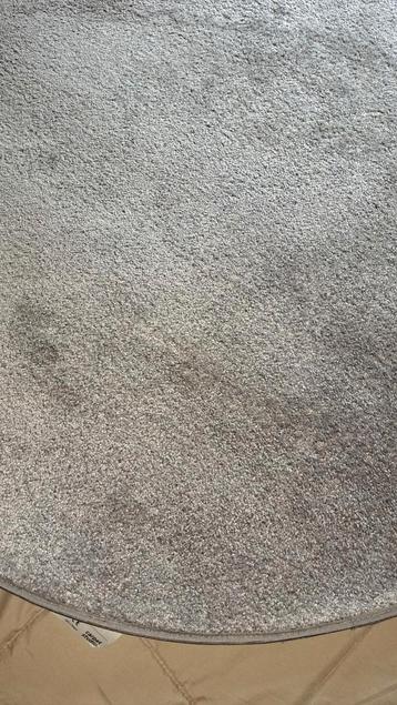 Ronde karpet plus een tafel loper 
