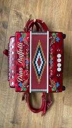 Accordeon trekzak dino baffetti rood stemming C-G, Muziek en Instrumenten, Accordeons, Gebruikt, Met riemen, Overige formaten