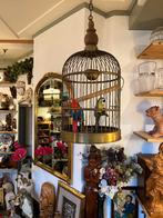 Grote koperen vogelkooi, Ophalen