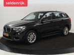 BMW X1 sDrive18i High Executive | Leder | Trekhaak | Harman/, Auto's, BMW, Lichtsensor, 136 pk, Zwart, Bedrijf
