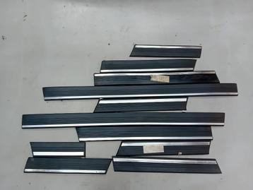 NOS carrosserie sierlijsten Saab 900 classic. beschikbaar voor biedingen