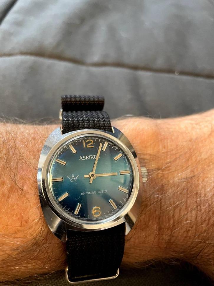 Vintage Aseikon mechanisch horloge, Sieraden, Tassen en Uiterlijk, Horloges | Antiek, Polshorloge, Overige merken, Staal, 1960 of later