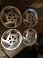 Set van 4 wieldoppen, Chevrolet Beretta, Corsica of Cavalier, Ophalen of Verzenden, Zo goed als nieuw