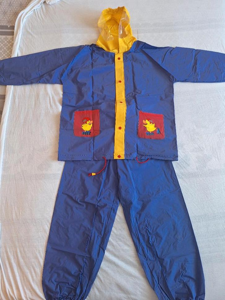 Regenpak paars met geel maat 128, Kinderen en Baby's, Kinderkleding | Maat 128, Zo goed als nieuw, Meisje, Overige typen, Ophalen of Verzenden