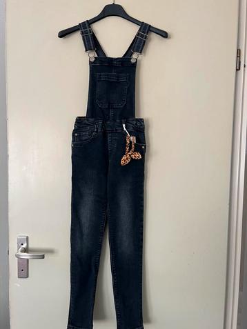 Jeans tuinpak 134 beschikbaar voor biedingen