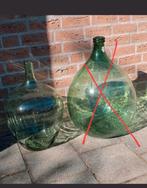 Een grote glazen flessen, Gebruikt, Ophalen of Verzenden, Glas, 75 cm of meer