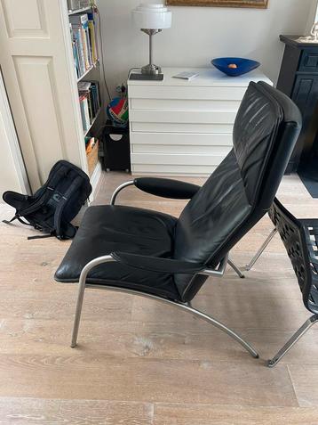 Design stoel leer gerepareerd beschikbaar voor biedingen