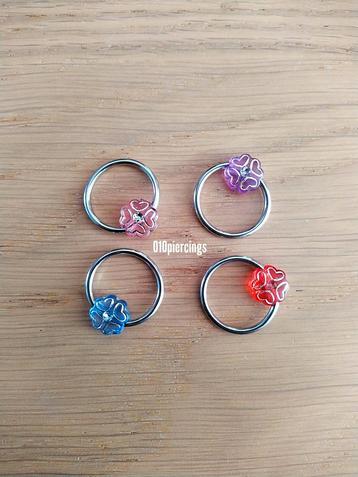 Nieuwe ball closure ring met verschillende steentjes.  beschikbaar voor biedingen