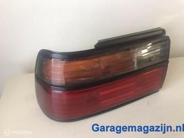 Achterlicht links 212-1987L-A Toyota Corolla VII Sedan E100 beschikbaar voor biedingen