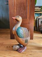 Grote houten eend, Ophalen