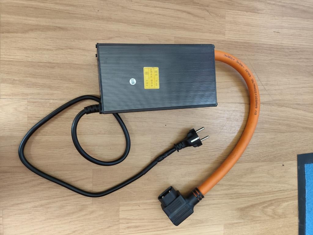 Acculader Super Soco CPX, Ophalen of Verzenden