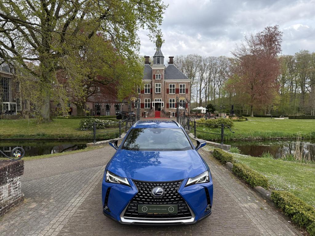 Lexus UX 300e Business 54 kWh | Led | Nieuwe Service & Garan, Auto's, Stof, Gebruikt, Zwart, Blauw