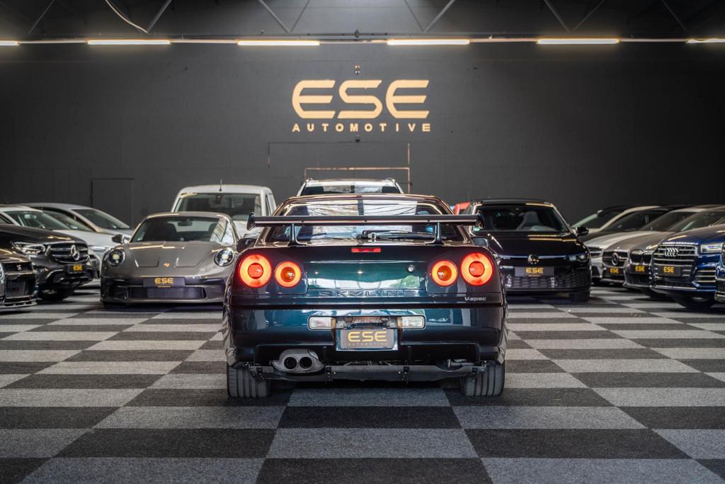 Nissan Skyline R34 GTR V-spec Midnight Purple II, Auto's, Nissan, Stof, Gebruikt, Zwart, Overige kleuren