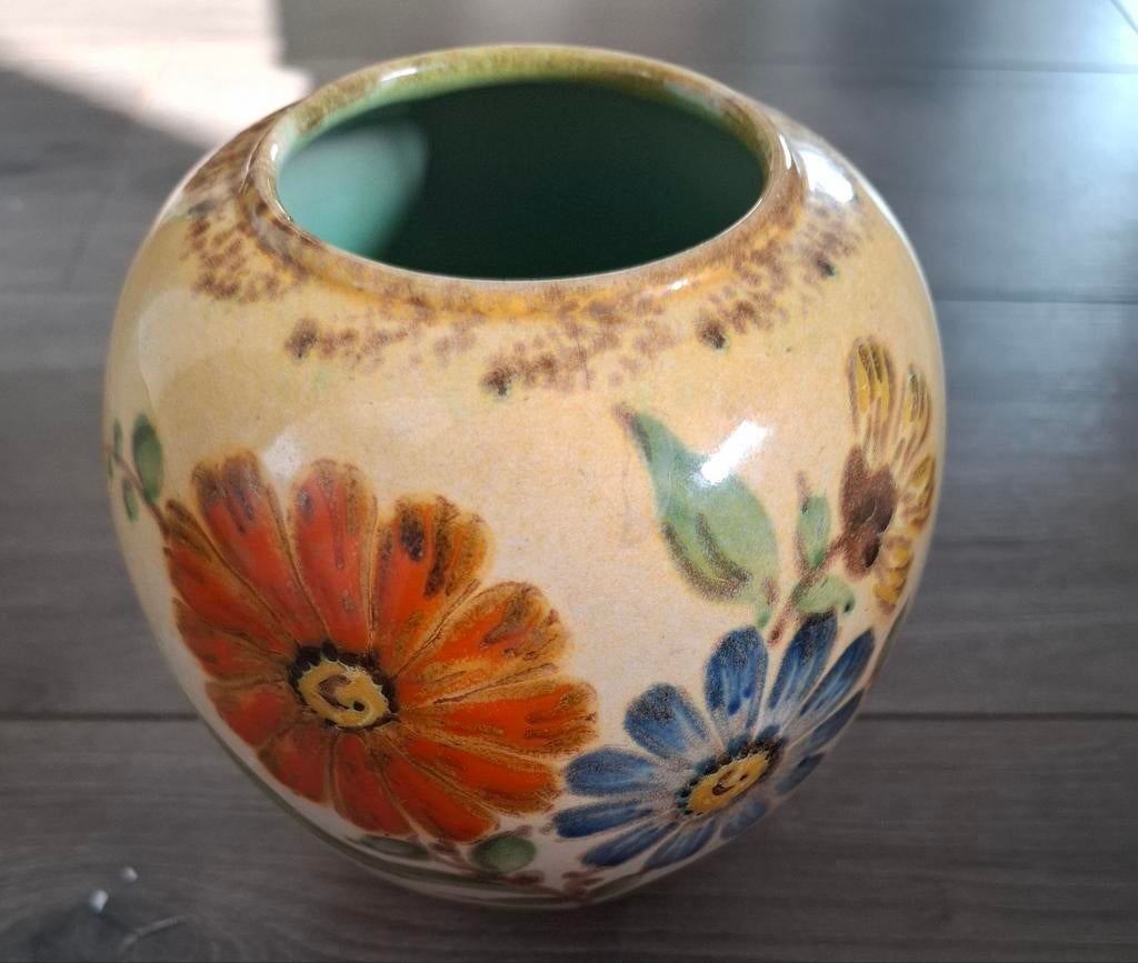 Gouds plateel vaas, Ophalen