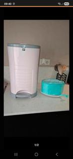 Roze luieremmer met zakken, Ophalen