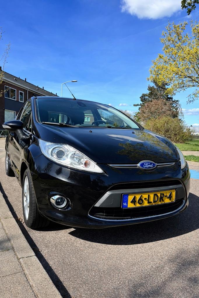 Ford Fiësta 1.25 60KW 5DR 2010 Zwart, Auto's, Ford, Particulier, Fiësta, Airbags, Airconditioning, Bluetooth, Centrale vergrendeling