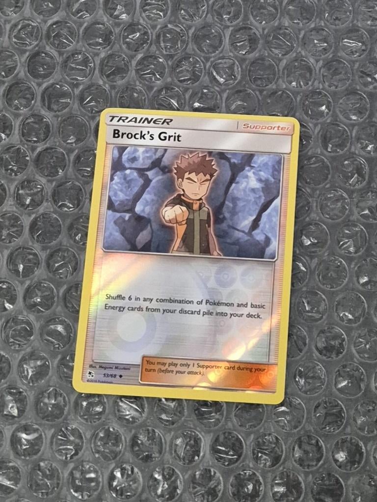 Reverse Brock's Grit 53/68 Sun & Moon Hidden Fates, Ophalen of Verzenden, Zo goed als nieuw, Losse kaart, Foil