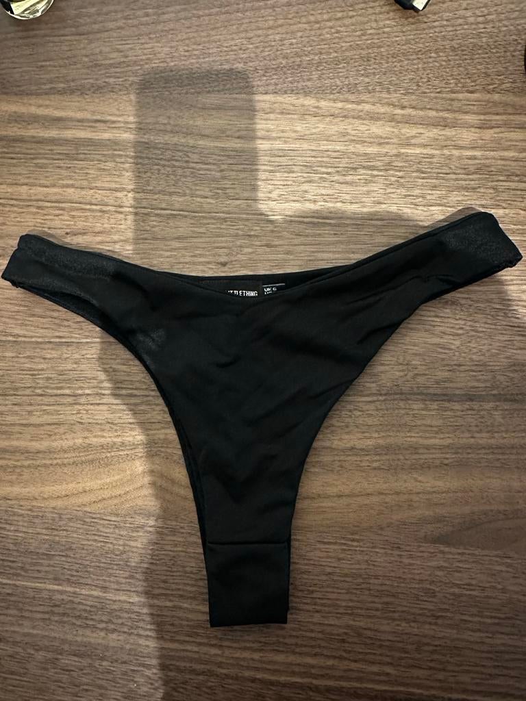 Zwarte bikini slip PrettyLittleThing maat 34, Kleding | Dames, Badmode en Zwemkleding, Ophalen of Verzenden, Zo goed als nieuw