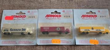 Arnold 6639/6640/6641 vrachtauto's met bierreklame nieuw.  beschikbaar voor biedingen