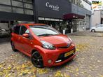 Toyota Aygo 1.0 VVT-i Dynamic Orange, Auto's, Toyota, Euro 5, Gebruikt, Overige kleuren, 4 stoelen