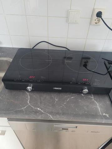 Zo goed als nieuwe inductie kookplaat te koop aangeboden beschikbaar voor biedingen