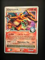 Charizard DP45 2009 lvl X - Redelijke Staat, Hobby en Vrije tijd, Verzamelkaartspellen | Pokémon, Ophalen of Verzenden, Gebruikt