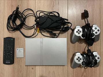Playstation 2 with 8Mb card,14 games,2 controlers,DVD remote beschikbaar voor biedingen