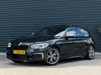 BMW 1-Serie M140i RWD | Pano | H&K | M perf | Leer | Camera, Auto's, Achterwielaandrijving, 74 €/maand, Zwart, USB