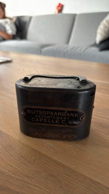 Antieke spaarpot beschikbaar voor biedingen