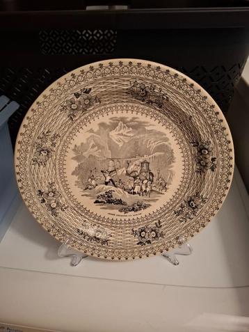 Porseleinen bord diameter 24cm met standaard beschikbaar voor biedingen