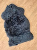 Schapenvacht 'Smidie' Ikea, Ophalen