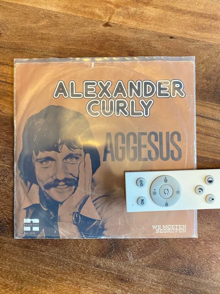 Alexander Curly - Aggesus Single, 7 inch, Single, Ophalen of Verzenden, Zo goed als nieuw