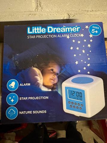 Kinder klok met projectie beschikbaar voor biedingen