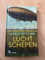 Luchtschepen - Amélie Nothomb, Boeken, Romans, Ophalen of Verzenden, Zo goed als nieuw, België