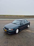 Mazda 323 1.8 I SDN GLX 16V HS U9 1994 Groen, Auto's, Voorwielaandrijving, 1071 kg, 4 cilinders, Origineel Nederlands